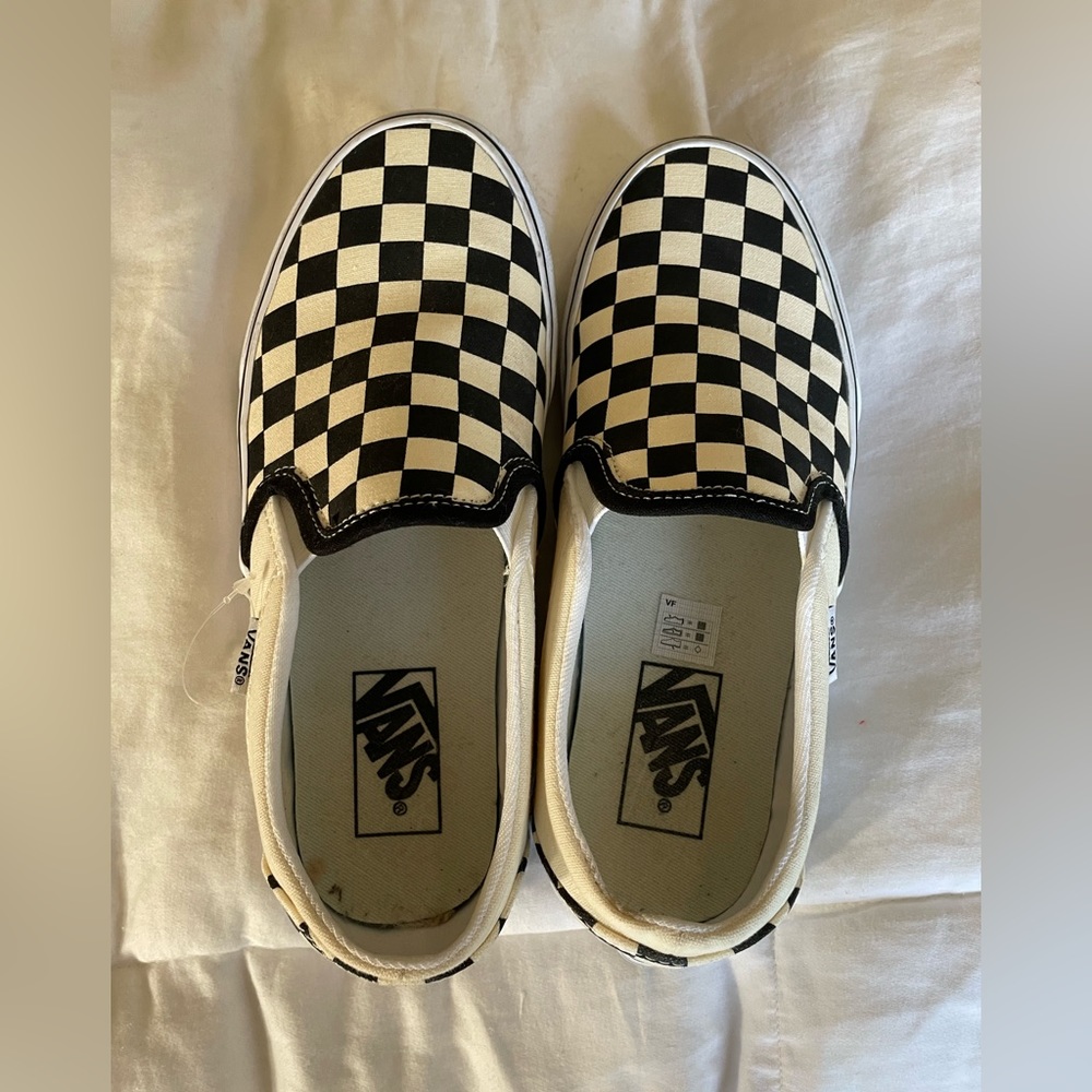 Vans (women’s size 7) black & white checkerboard slip on shoes